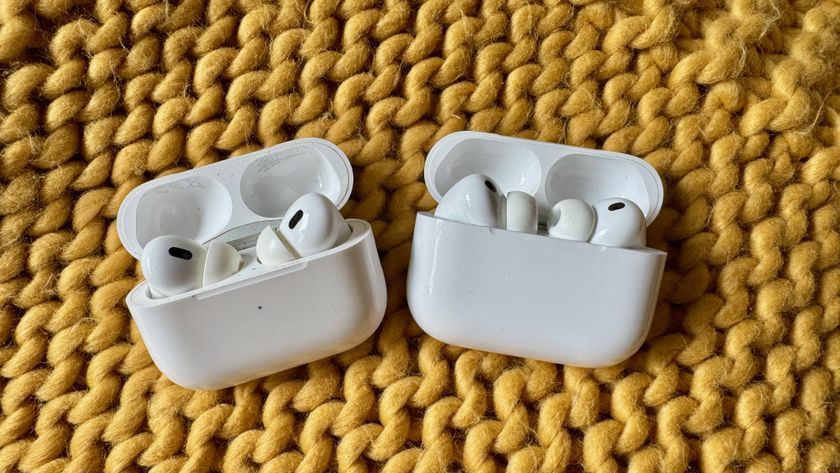 AirPods Pro 3 and AirPods Pro 2 side-by-side on a knitted yellow throw.