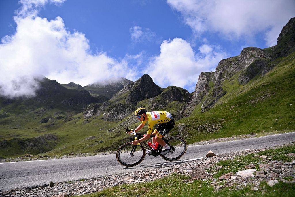 Team UAE Emirates Tadej Pogacar of Slovenia wearing the overall leaders yellow jersey descends the Tourmalet pass during the 18th stage of the 108th edition of the Tour de France cycling race 129 km between Pau and Luz Ardiden on July 15 2021 Photo by AnneChristine POUJOULAT AFP Photo by ANNECHRISTINE POUJOULATAFP via Getty Images