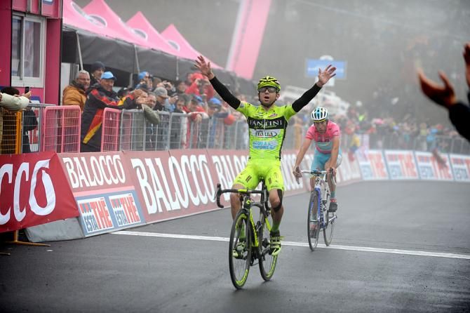 Mauro Santambrogio celebrates winning stage 14