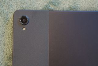 A close-up of the back camera lens on the Lenovo Tab P11 Plus