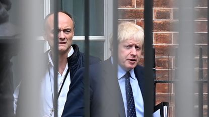 Boris Johnson and Dominic Cummings leave Downing Street