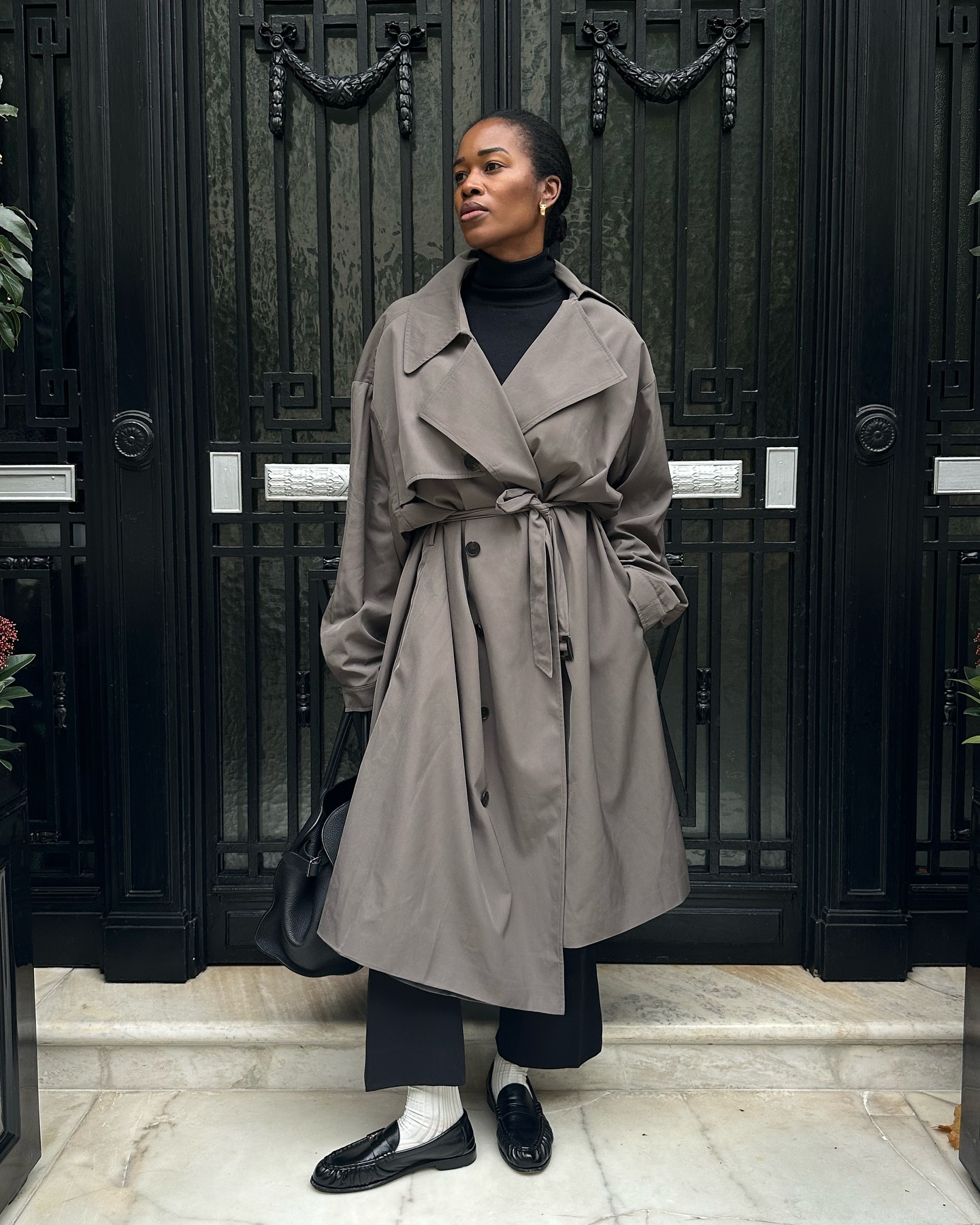 An image of @nlmarilyn wearing a chic loafers outfit, proving that loafers are in style in 2025.