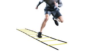 man running on GHB Pro agility ladder