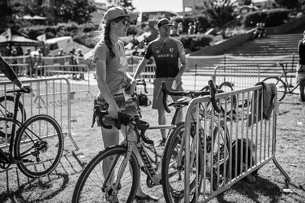 Brenna Wrye-Simpson in the mechanic pit at a cyclo-cross race
