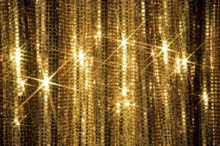 shiny gold curtain reflecting in the light