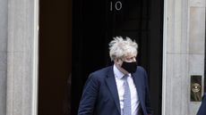 Boris Johnson leaves No. 10 Downing Street to attend PMQs