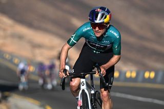 SKYVIEWS OF HARRAT UWAYRID SAUDI ARABIA JANUARY 31 Tom Pidcock of The United Kingdom and Q365 Pro Cycling Team Green Leader Jersey attacks in the final climb during the 5th AlUla Tour 2025 Stage 4 a 1409km stage from Maraya to Skyviews of Harrat Uwayrid 1159m on January 31 2025 in Skyviews of Harrat Uwayrid Saudi Arabia Photo by Szymon GruchalskiGetty Images