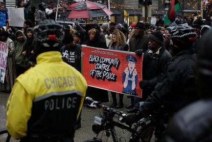 Demonstrators protest the fatal shooting of Laquan McDonald along Chicago's Magnificent Mile 