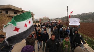 Demonstrators protesting against the Syrian government