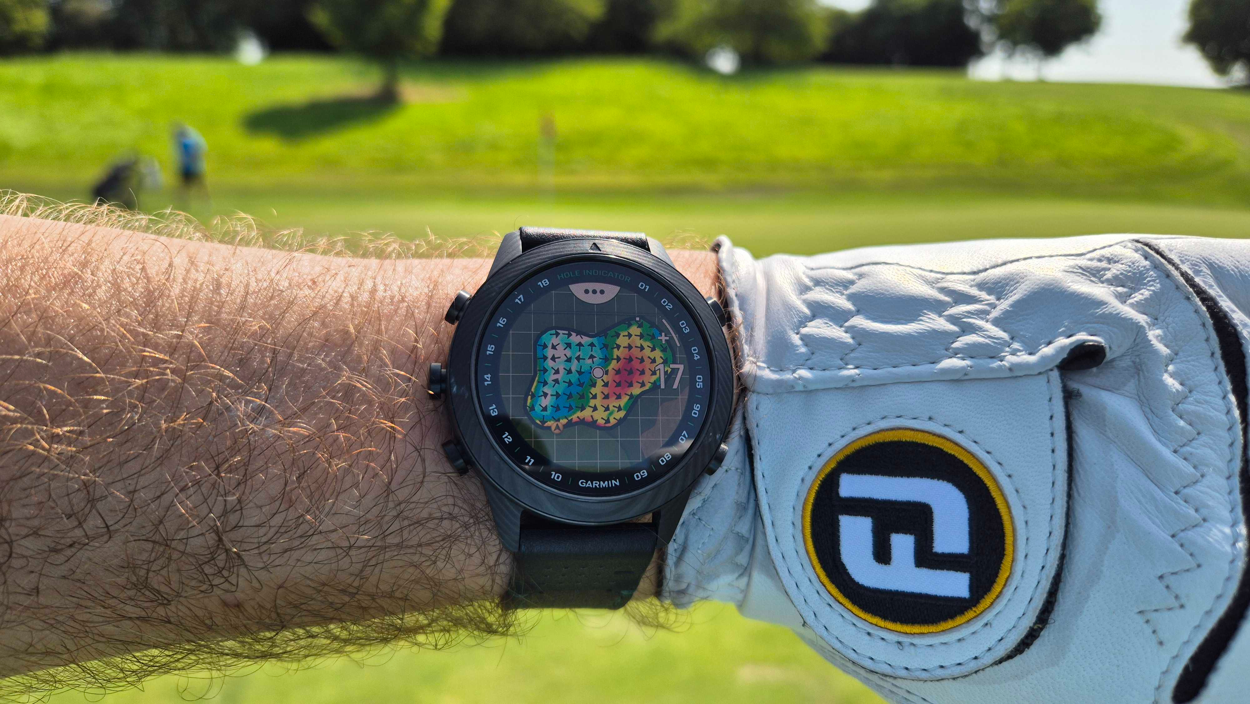 The Garmin MARQ Golfer (Gen 2) on a wrist on the golf course