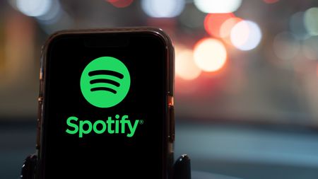 Spotify app on a smartphone in a car