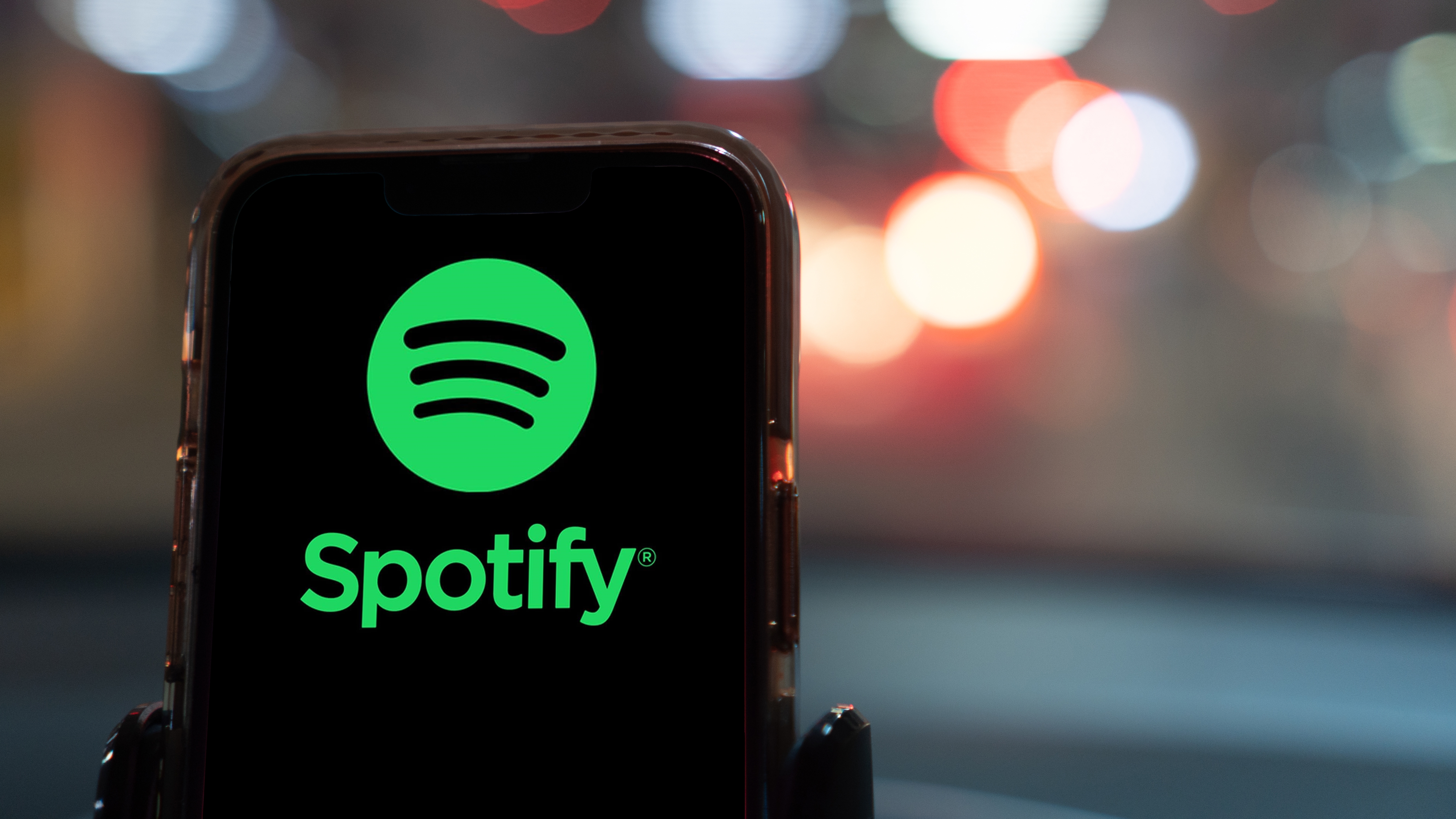 Spotify app on a smartphone in a car