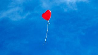 How to stop anxiety ruining your sleep, according to a psychologist: a red balloon floats through the air