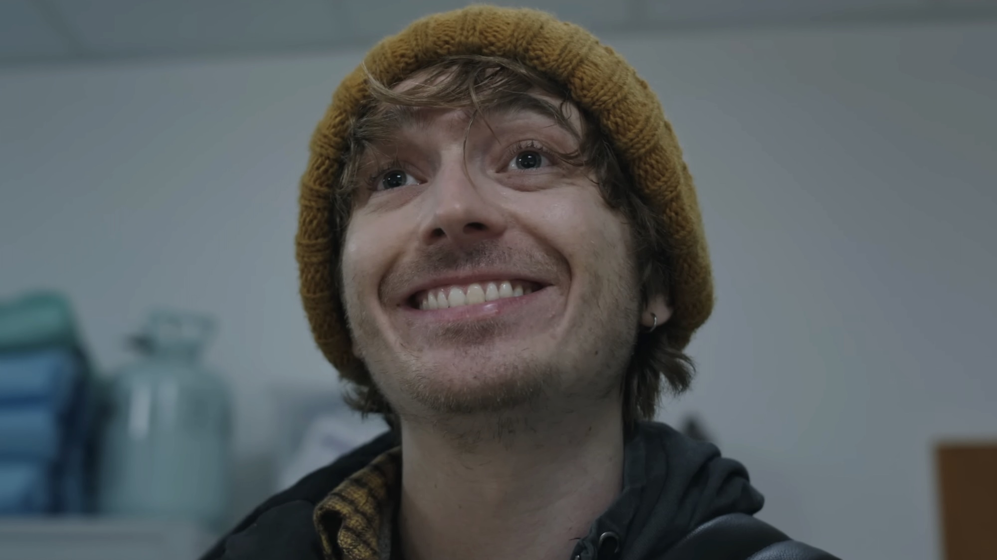 Bryan smiling widely at hospital worker in Resident Evil