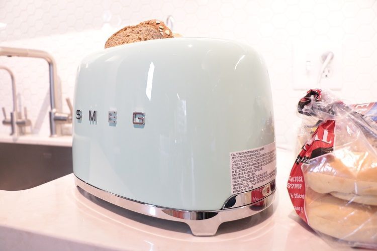 SMEG 2 Slice image: The crumb tray is on the back and pops out when you press it.
