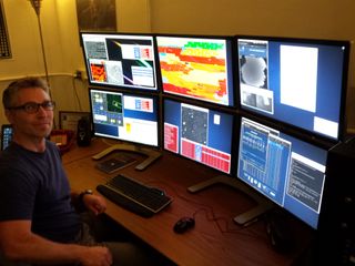Astronomer Gregory Leonard at the Catalina Sky Survey observing station.