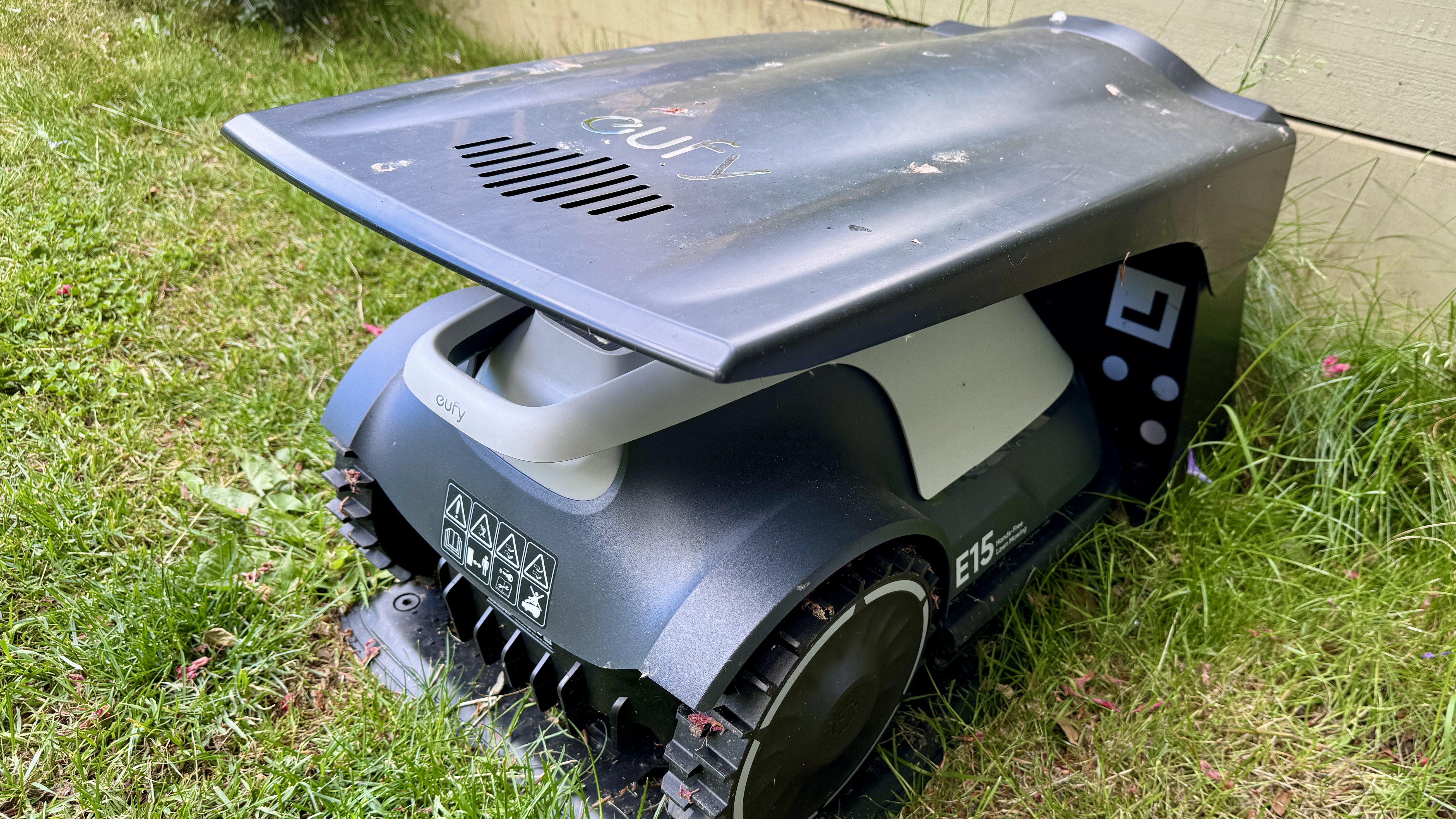 Eufy E15 robot lawn mower on its charge station