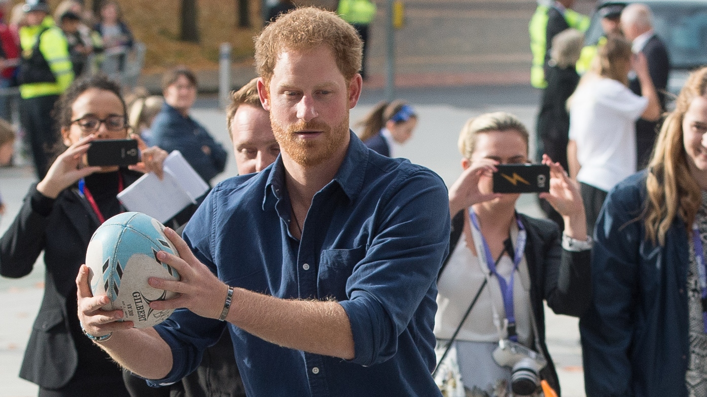Prince Harry plays rugby with children as part of the Coach Core sporting apprenticeships at National Ice Centre on November 6, 2016
