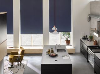 navy blue roller blinds in a kitchen