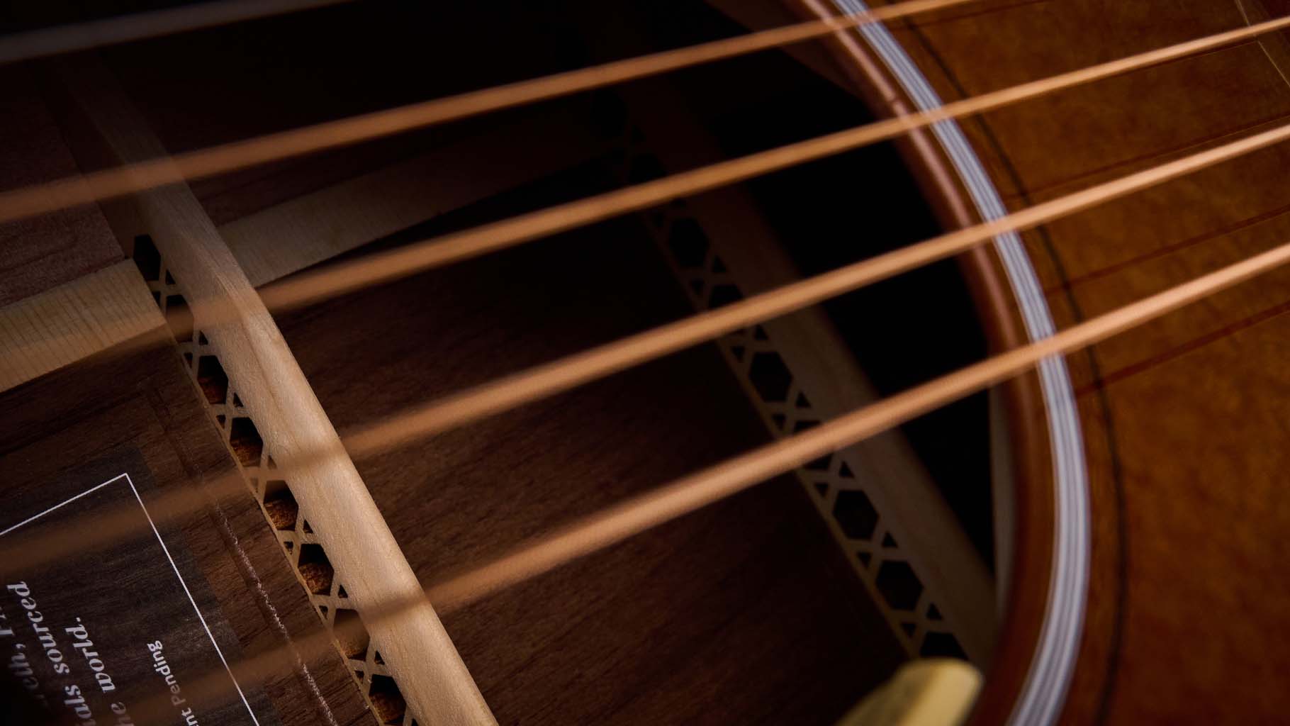 Martin GPE Inception Maple photographed against a wheat coloured woven rug.
