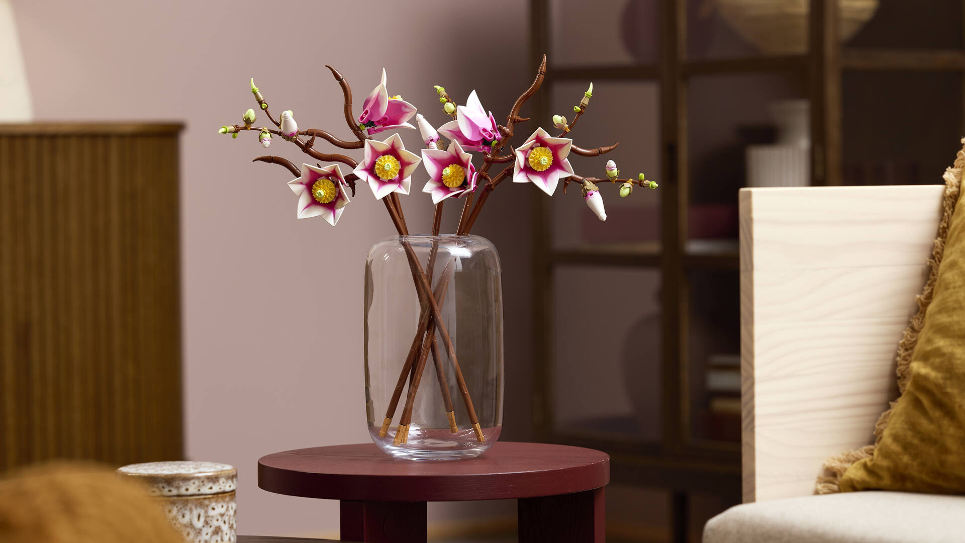 Lego Magnolia Branches in a glass vase, on a side table
