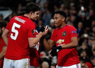 Anthony Martial celebrated with Harry Maguire after scoring his side's second goal