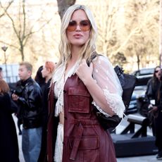 Influencer wears chunky wedges.