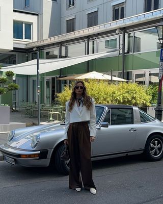 Autumn Microtrends 2024: @immegii  wears a cropped blazer with wide-leg trousers and loafers