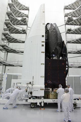 Technicians Move Payload of TDRS-K Spacecraft