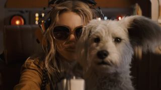 Krytpto and Kara riding through space in Supergirl