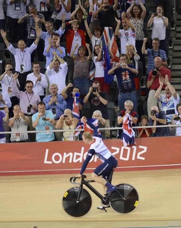 Sir Chris Hoy salutes the crowd after winning gold