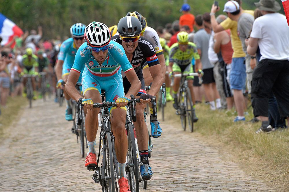 Vincenzo Nibali picks up the pace on the cobbles.
