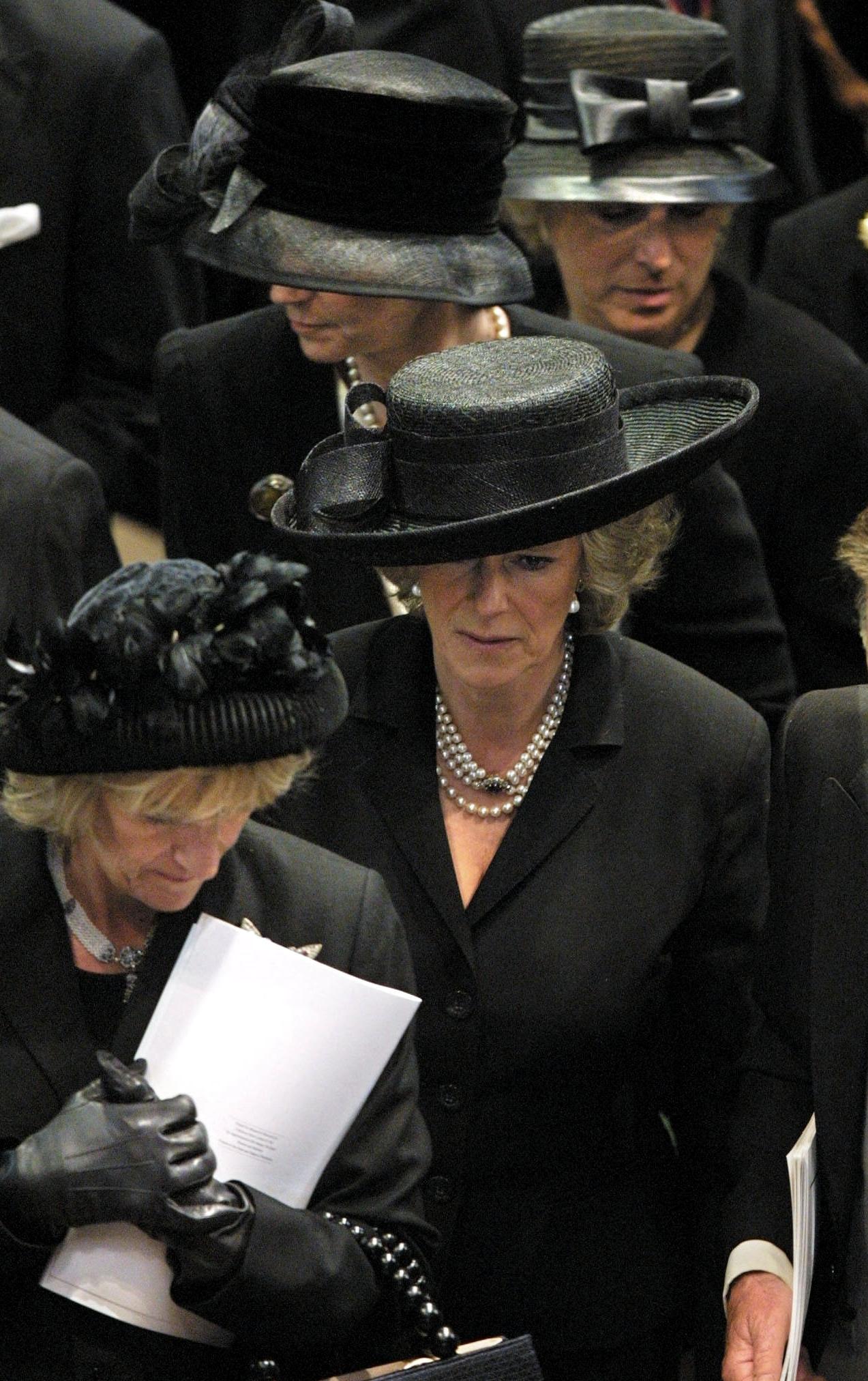Queen Camilla wears a black outfit to attend the Queen Mother&#039;s funeral on April 9, 2002