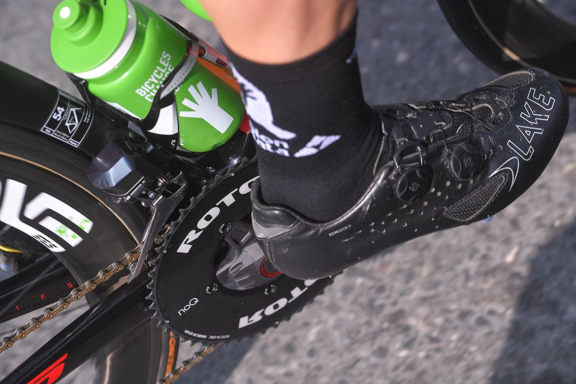 The Qhubeka logo on the bottles of the Dimension Data team