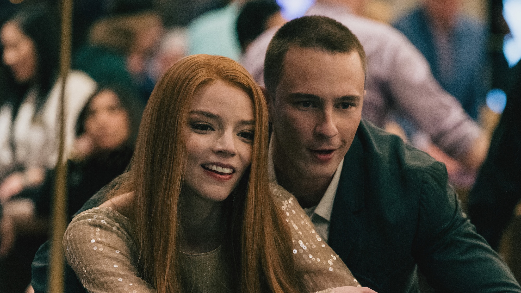 Lucky smiling at casino table with Cary standing behind her in Lucky Season 1