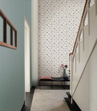 Hallway with two different wallpaper designs on different walls