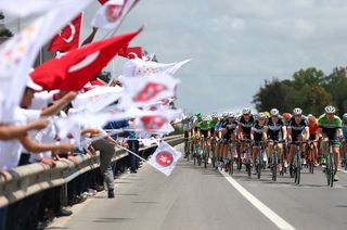 The fans cheer on the riders during the Tour of Turkey