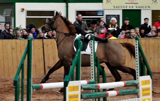 &ldquo;This is me and my ex-racehorse Dalida. We entered our first riding club indoor competition in 2010. There was a cafe next to the arena which the first fence faced this. Dalida spooked and then cat leaped the fence. I lost my stirrup leather and nearly came off but managed to clamber back on. We completed the course without stirrups and with just four faults from the first fence and within the time set&rdquo; &mdash; Sue Hardy