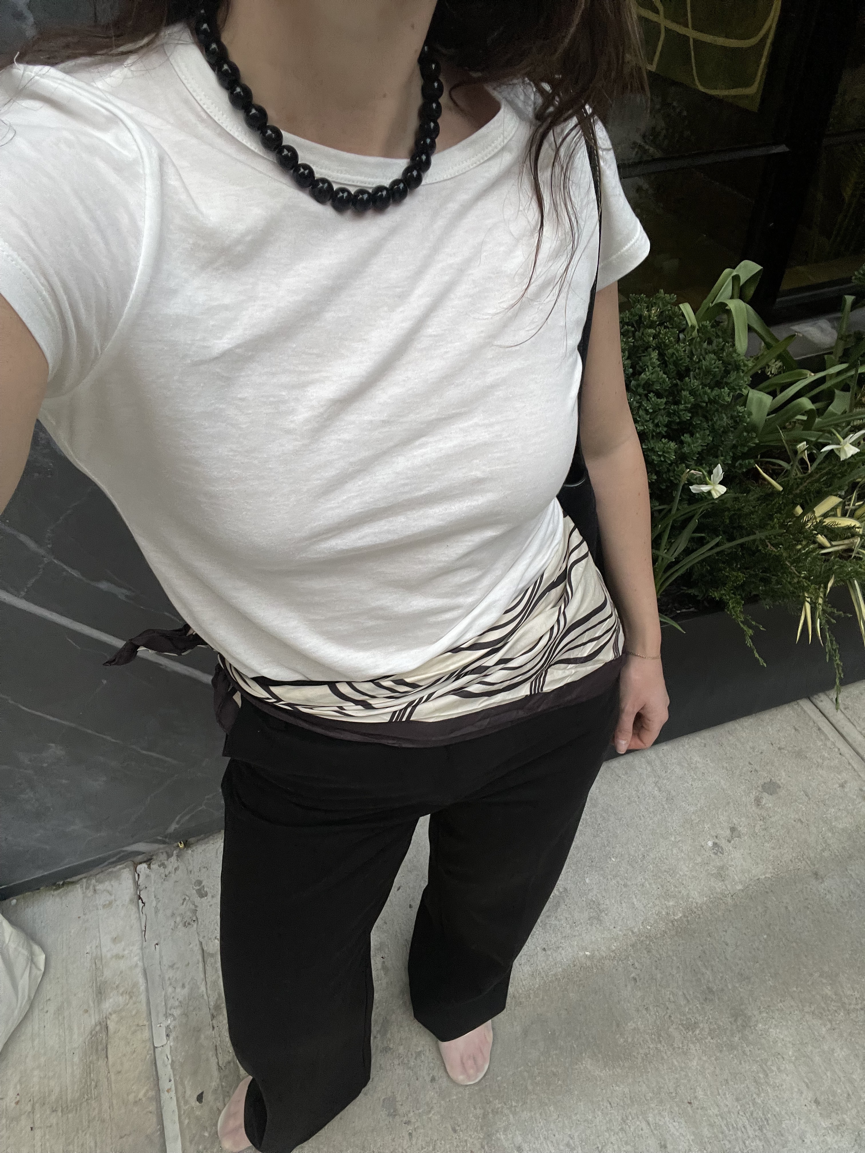 Anna LaPlaca wearing the scarf belt styling trick