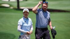 ustralia's Minjee Lee walks with her caddie Brad Beecher after a practice round at the Australian Golf Club in Sydney on November 29, 2023, ahead of the Australian Open golf tournament starting on November 30.