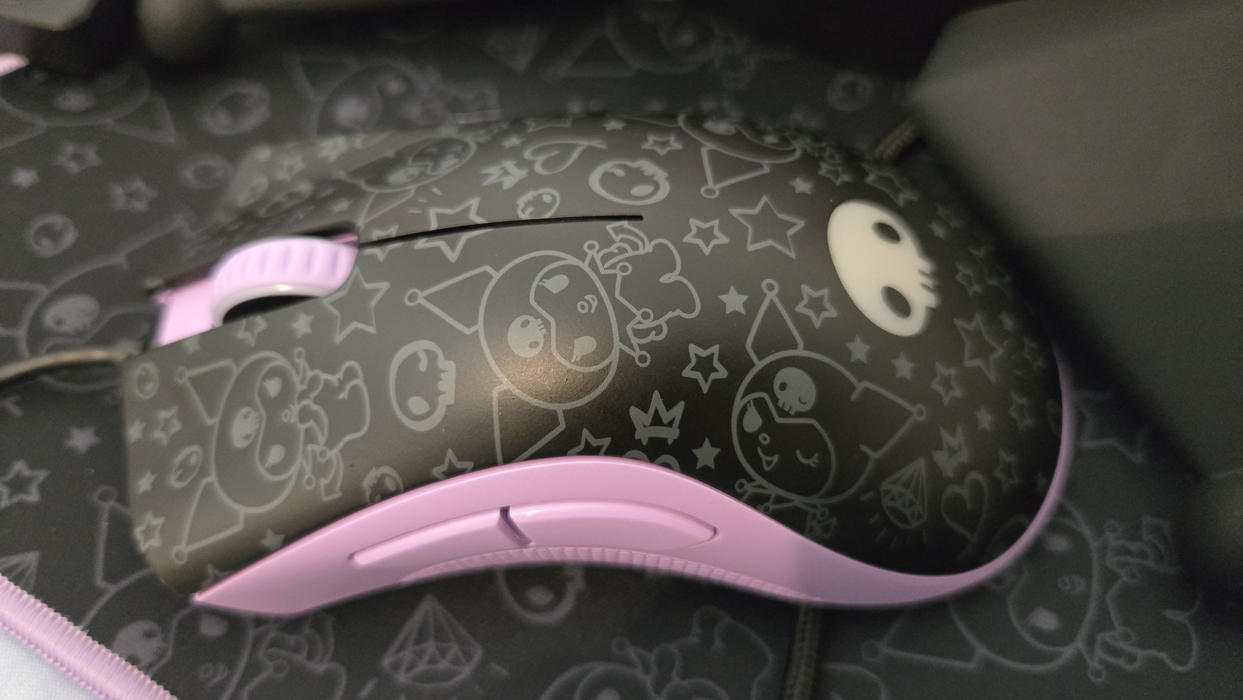 Razer | Kuromi collection peripherals laid out on a desk.