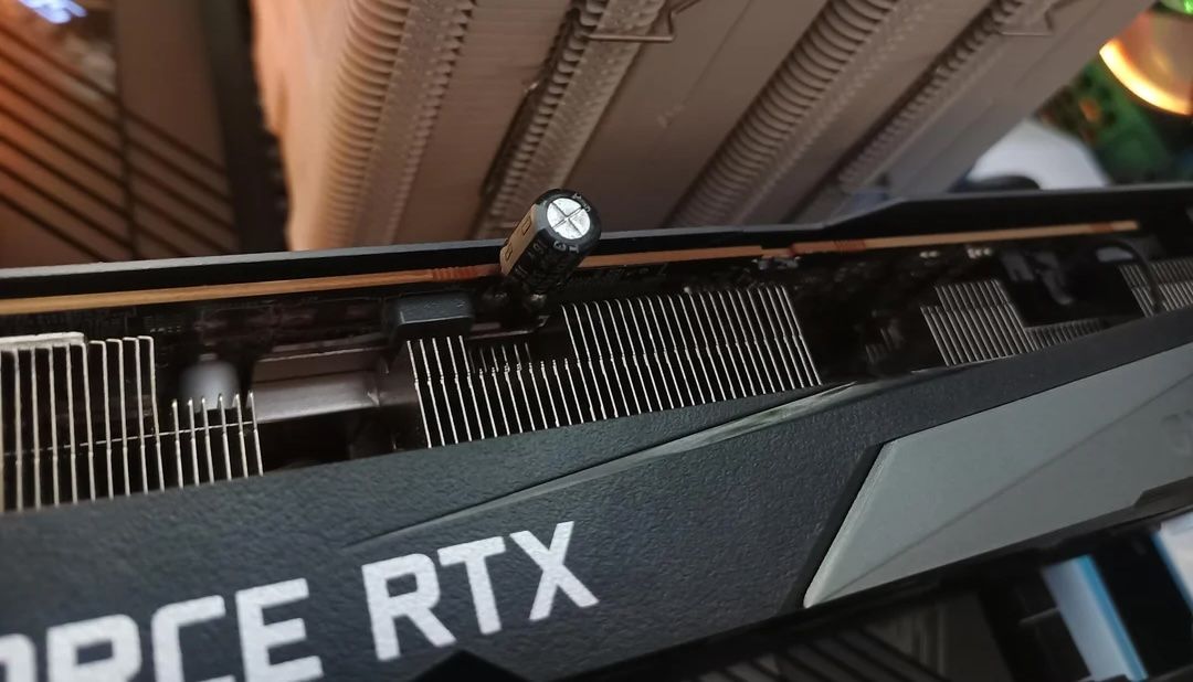 Ingenious father fixes dead RTX 3070 with a jerry-rigged capacitor from an old radio — Saves worried son $120 in repair costs, GPU 'works better than before' now