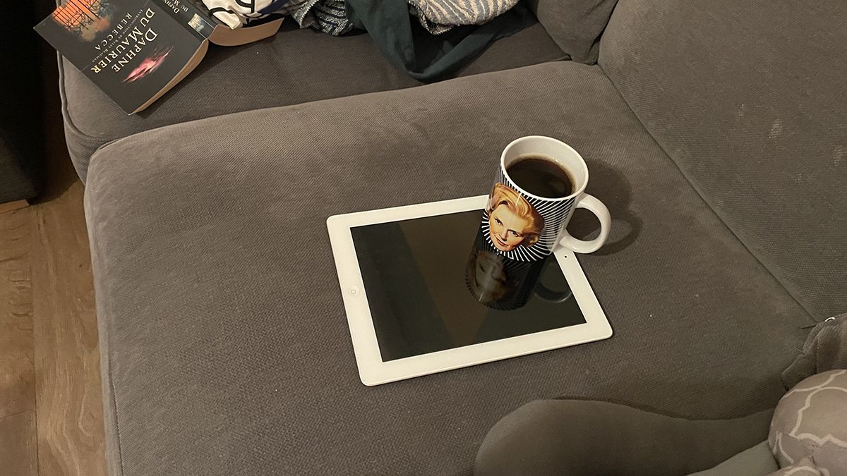 My old 4th Gen iPad with a mug of coffee resting on it. 