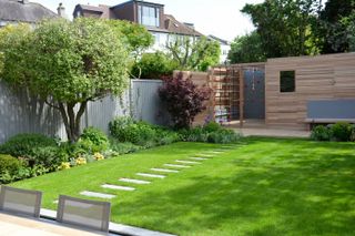 how to design a child friendly garden: tom howard garden with climbing wall