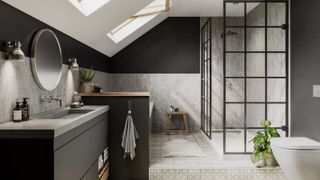 A loft conversion bathroom with velux windows, monochrome accessories, dark walls and wet wall panels in a light slate grey colour