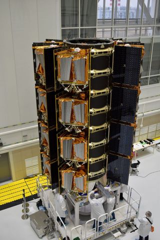 A stack of 36 OneWeb internet satellites are seen in launch configuration ahead for OneWeb's Launch 6 mission liftoff off in late April 2021.