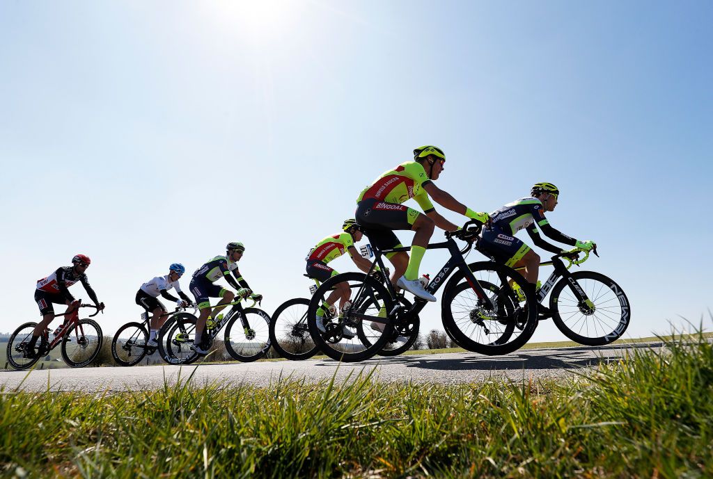 LIEGE BELGIUM APRIL 25 Laurens Huys of Belgium Mathijs Paasschens of Netherlands and Team Bingoal WB Tomasz Marczynski of Poland and Team Lotto Soudal Sergei Chernetskii of Russia and Team Gazprom Rusvelo Lorenzo Rota of Italy Loic Vliegen of Belgium and Team Intermarch Wanty Gobert Matriaux Aaron Van Poucke of Belgium and Team Sport Vlaanderen Baloise in the Breakaway during the 107th Liege Bastogne Liege 2021 Mens Elite a 2595km race from Bastogne to Lige LBL on April 25 2021 in Liege Belgium Photo by Bas CzerwinskiGetty Images
