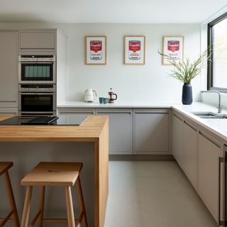 white kitchen with worktop and cabinets