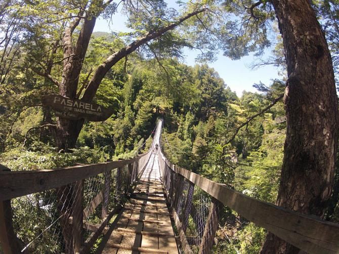 Mary McConneloug on one of the scarier suspension bridge crossings... Only one person at a time!