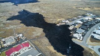 Three homes burned when a new fissure opened up at the edge of Grindavík on Jan. 14, 2024.